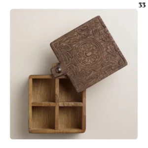 Engraved square wooden jewelry box with handle.