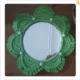 Decorative mirror with macrame frame and floral design