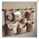 Knitted notebook and charger wall organizer