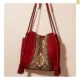 Suede shoulder bag with traditional design and special red color