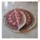A pair of handmade Nain round rugs, 1.5 meters in diameter