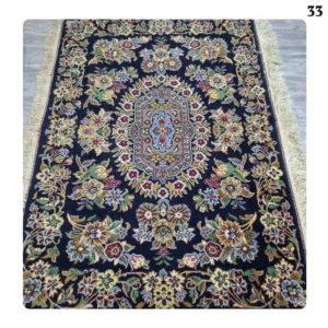 A pair of handmade Kashan carpets, silk flowers